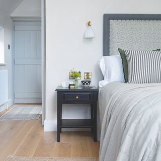 farmhouse with modern extension decorated in shades of grey and white