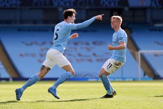 Manchester City made it 20 victories in a row as John Stones hit the winner against West Ham.