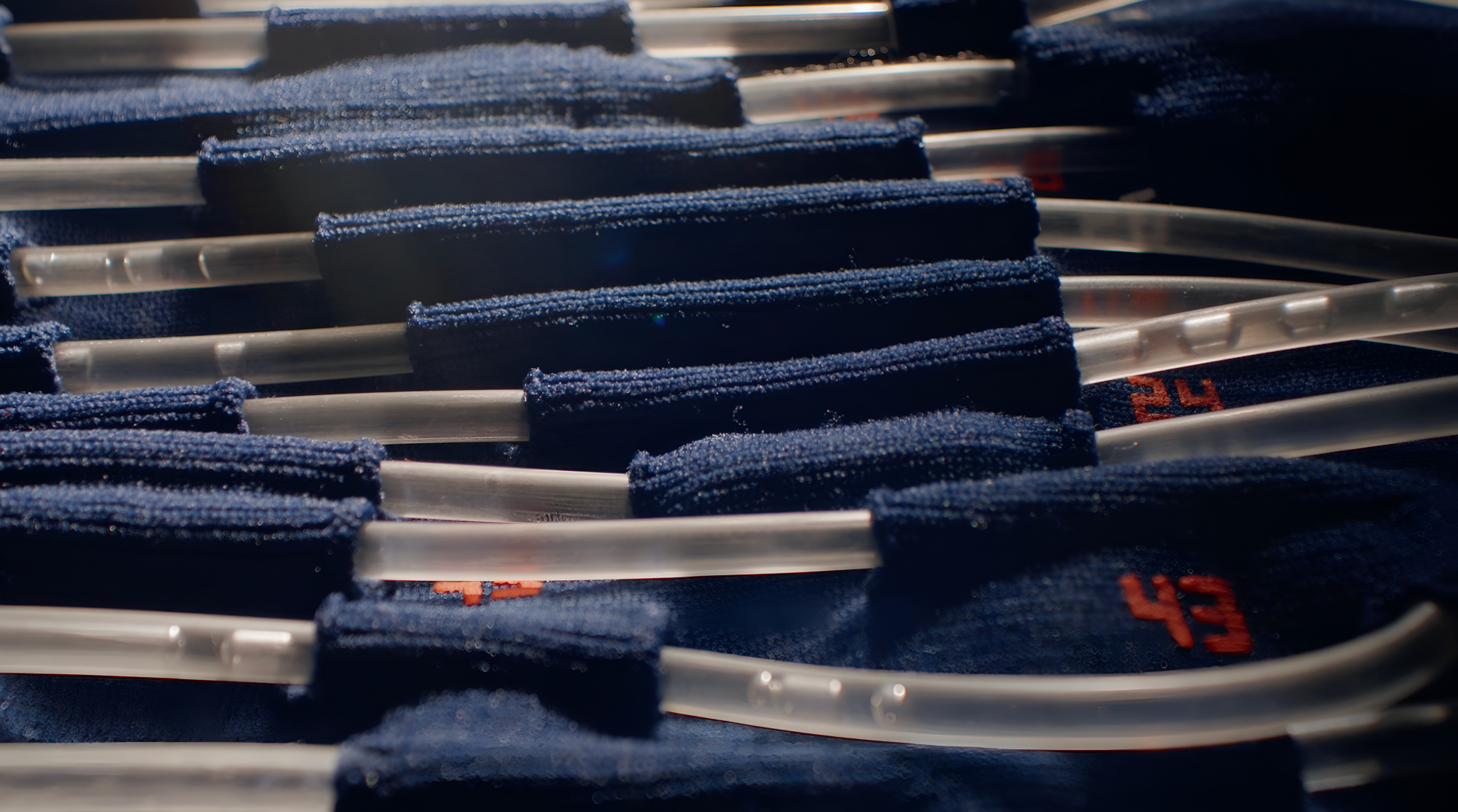 A close up of liquid cooling tubes running through an Axiom spacesuit undergarment.