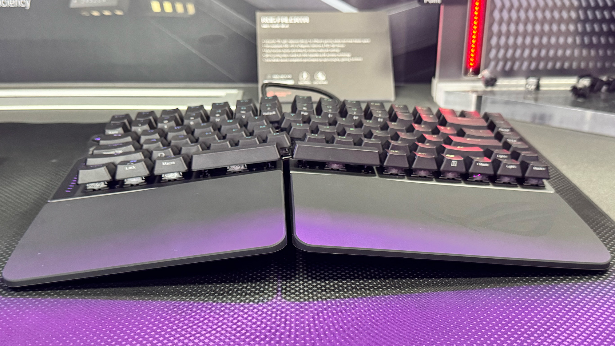Asus ROG Falcata gaming keyboard showing a configuration angled at the middle.
