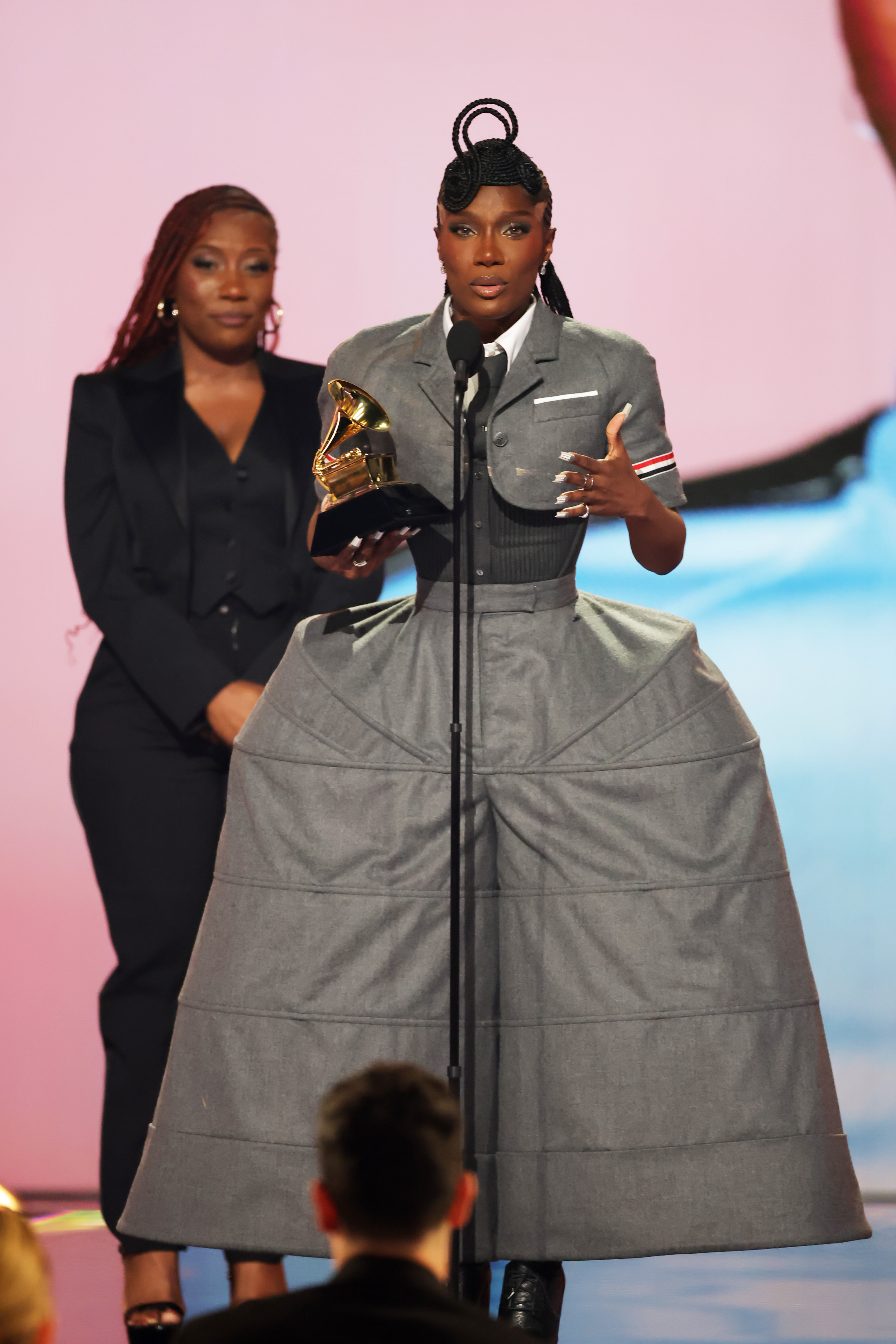 LOS ANGELES, CALIFORNIA - FEBRUARY 02: Doechii (R) accepts the Best Rap Album award for "Alligator Bites Never Heal" with Celesia Moore (L) onstage during the 67th Annual GRAMMY Awards at Crypto.com Arena on February 02, 2025 in Los Angeles, California. (Photo by Kevin Winter/Getty Images for The Recording Academy)