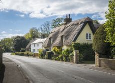 Thatched cottage in English village