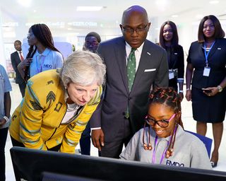 Teresa May in Nigeria with tech student