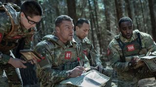War Machine. (L-R) Heather Burridge as 122, Alan Ritchson as 81, Yuchen Wang as 111 and Victory Noukwe as 135 in War Machine. Cr. Ben King/Netflix &copy; 2026.
