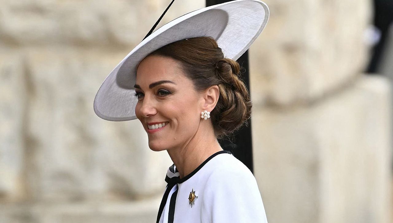 Kate Middleton attends trooping the colour in a white dress by jenny packham with pearl earrings