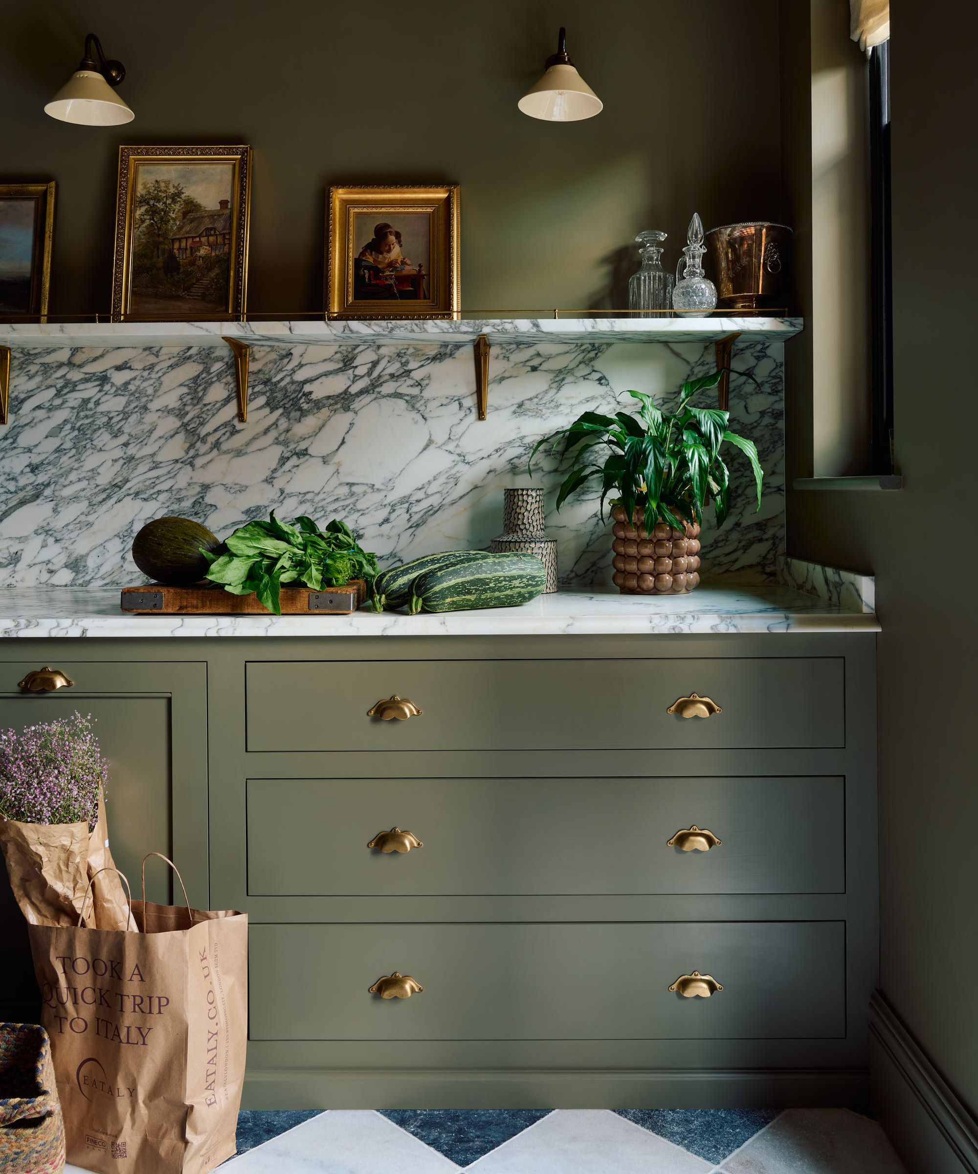 Olive green kitchen cabinets are a huge trend for 2024…