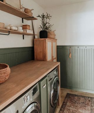 laundry room with beadboard and open shelving