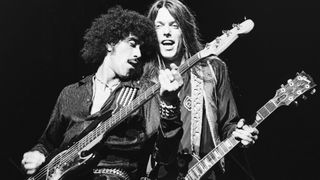 Phil Lynott (left) and Scott Gorham perform with Thin LIzzy at London's Hammersmith Odeon, 1978. 