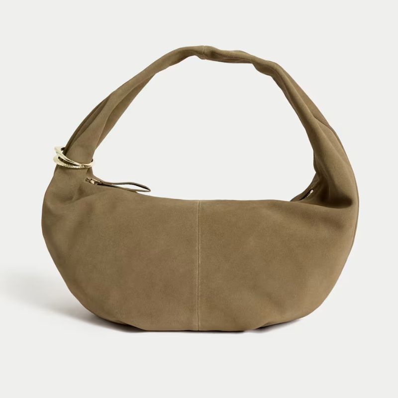 A cutout of a khaki M&S suede handbag