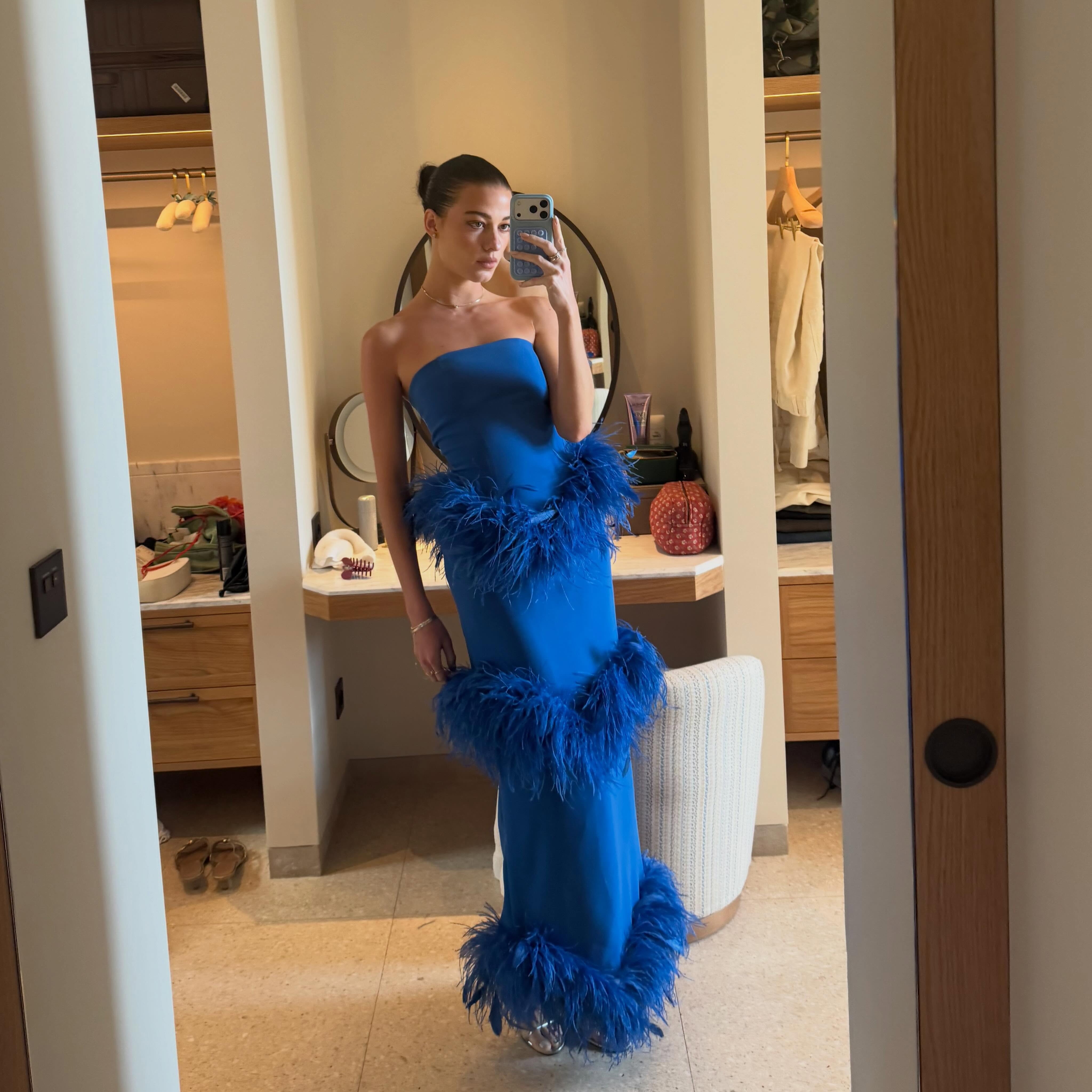 rebecca wears an embellished cobalt blue gown.