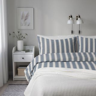 Bedroom with striped bedding
