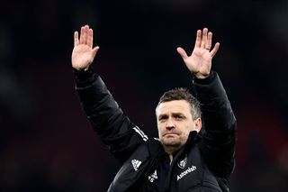 MANCHESTER, ENGLAND - FEBRUARY 08: Michael Skubala, Interim Manager of Leeds United, acknowledges the fans after the Premier League match between Manchester United and Leeds United at Old Trafford on February 08, 2023 in Manchester, England. (Photo by Naomi Baker/Getty Images)