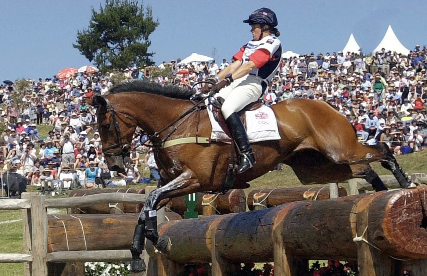 Great Britain's Pippa Funnell on Supreme Rock leaping the water obstacle on the Cross Country Section of the Team Three Day event, at the 2000 Olympic Games in Sydney, Australia.