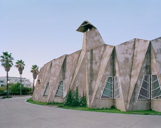 La Cité Oasis, a photographic series on La Grande Motte, shot by Charly Broyez & Laurent Kronental and showing sculptural, white and geometric modernist architecture in the south of france, surrounded by green spaces and in monumental scale