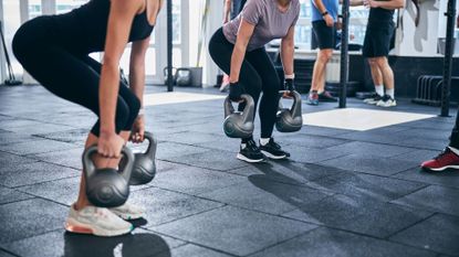 Women setting up for deadlift