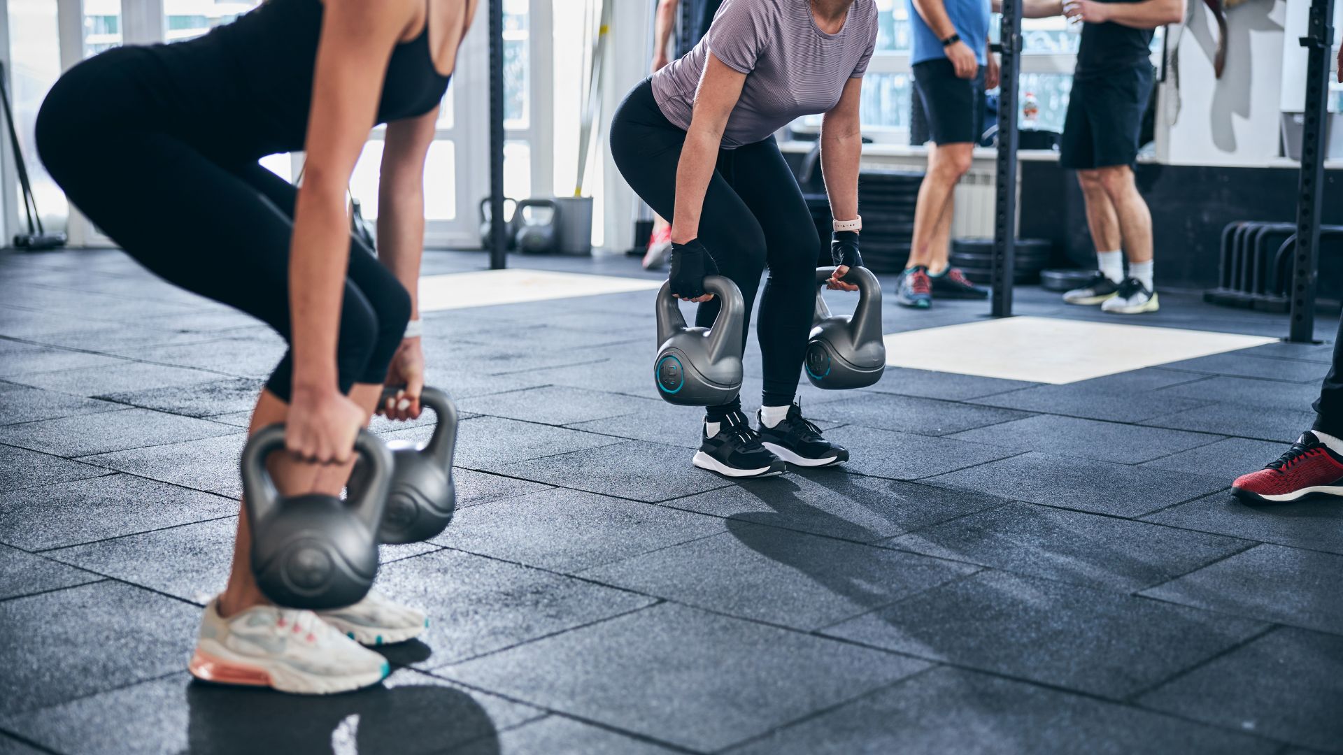 Women setting up for deadlift 