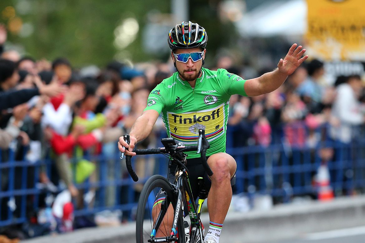 Peter Sagan pulls a wheelie for the fans