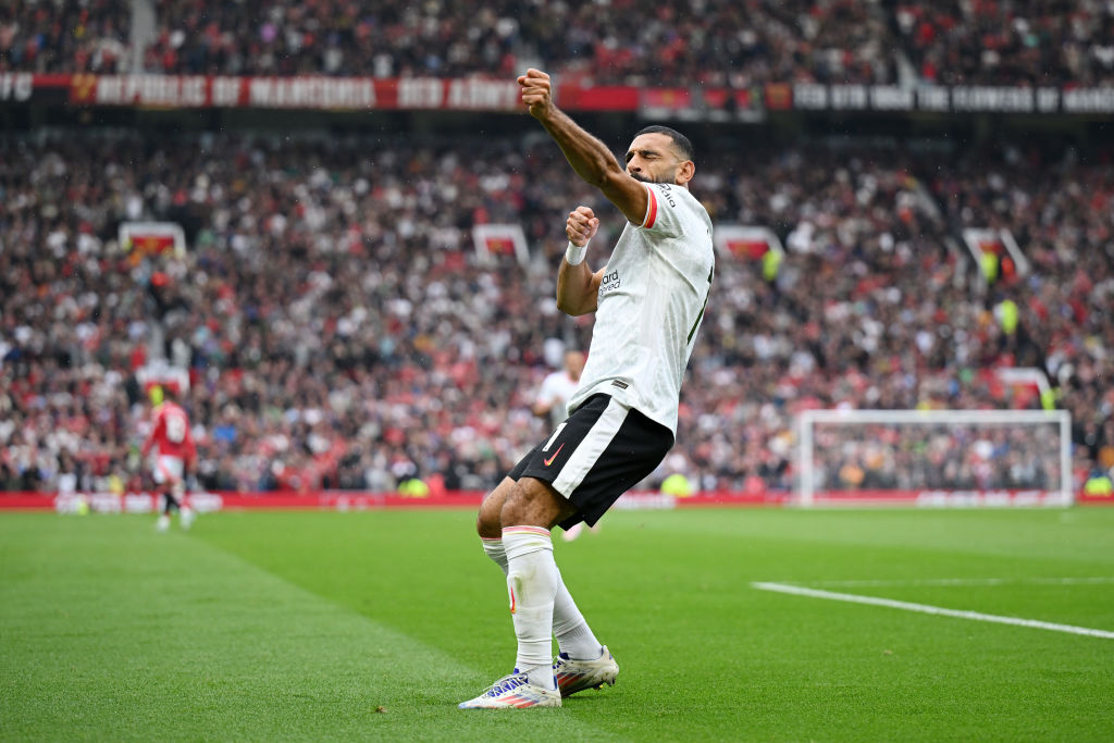 MANCHESTER, ENGLAND - SEPTEMBER 01: Mohamed Salah of Liverpool celebrates scoring his team's third goal during the Premier League match between Manchester United FC and Liverpool FC at Old Trafford on September 01, 2024 in Manchester, England. (Photo by Michael Regan/Getty Images)