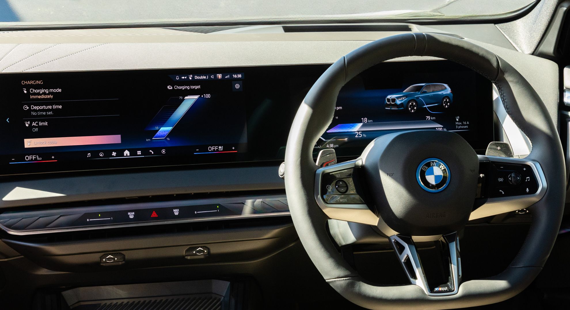 A BMW steering wheel, instrument cluster and infotainment system