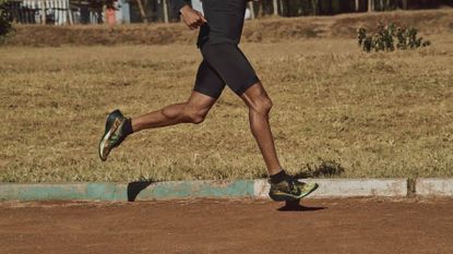 Best compression shorts: Pictured here a person running on a track wearing Nike running shoes and compression shorts