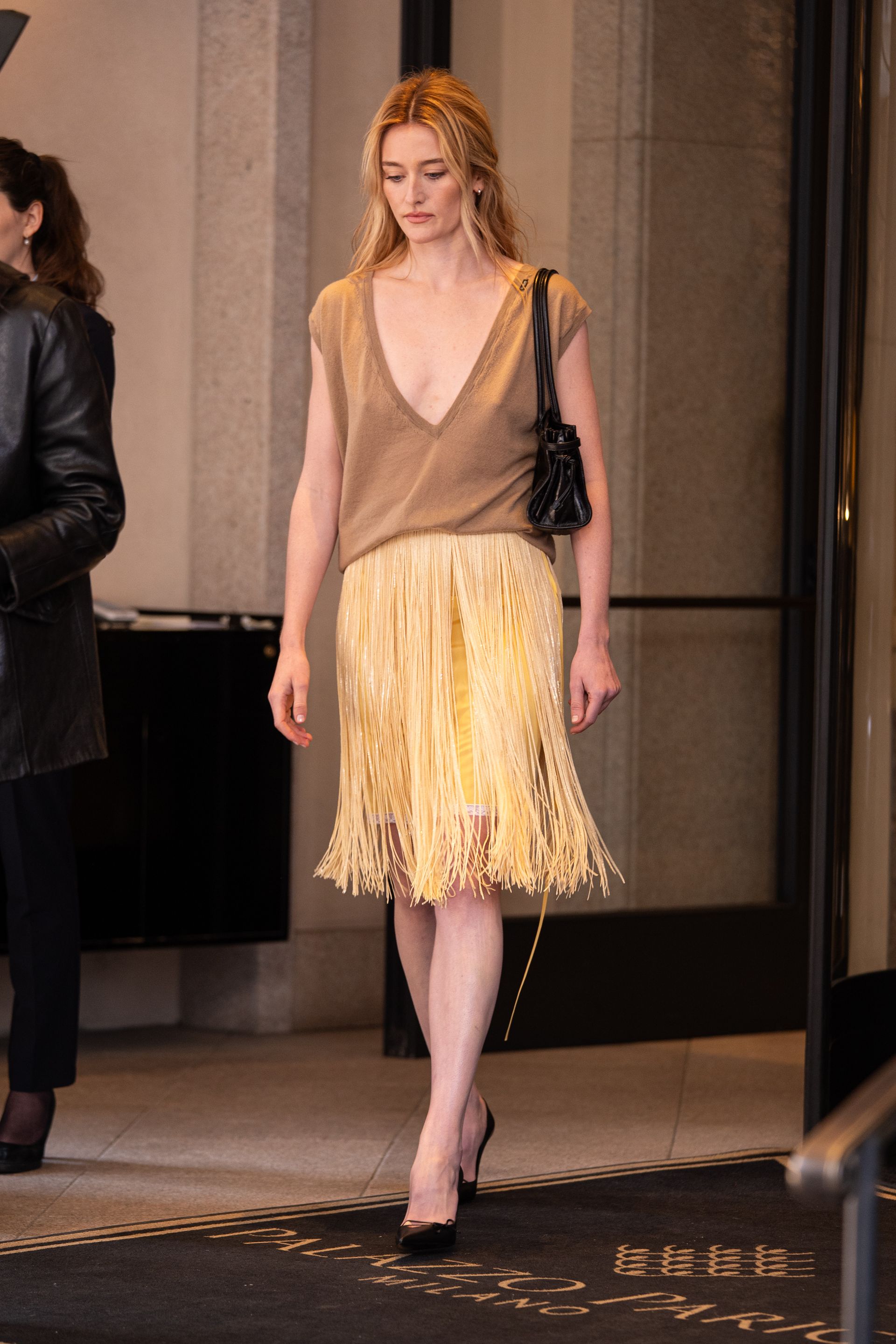 Sarah pidgeon wears the prada bonnie bag.