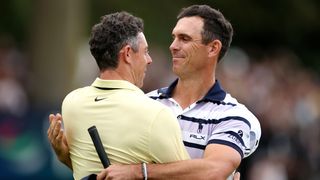 Rory McIlroy and Billy Horschel embrace after the BMW PGA Championship at Wentworth