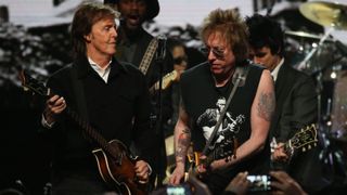 Paul McCartney and Ricky Byrd perfoms songs by Ringo Starr onstage during the 30th Annual Rock And Roll Hall Of Fame Induction Ceremony at Public Hall on April 18, 2015 in Cleveland, Ohio.