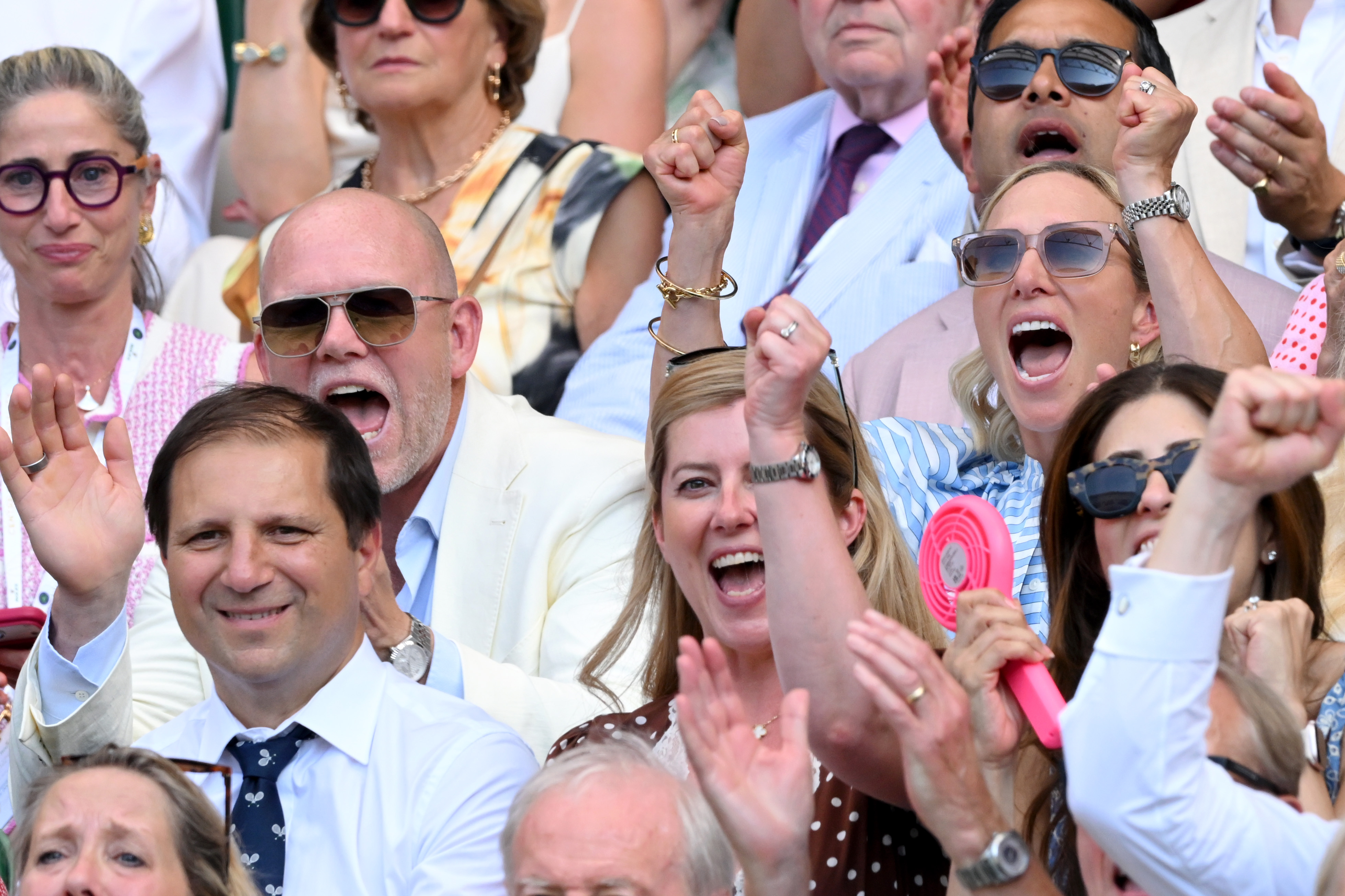 Zara and Mike Tindall cheering at Wimbledon