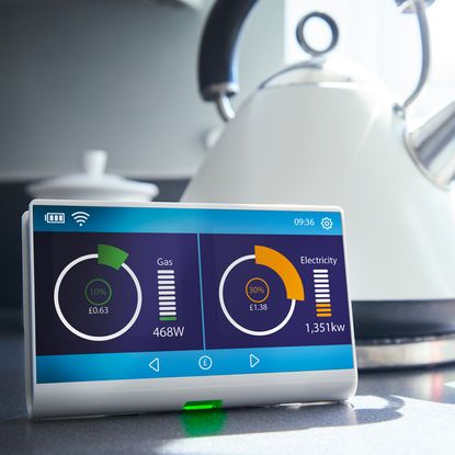 Smart meter on kitchen worktop beside kettle