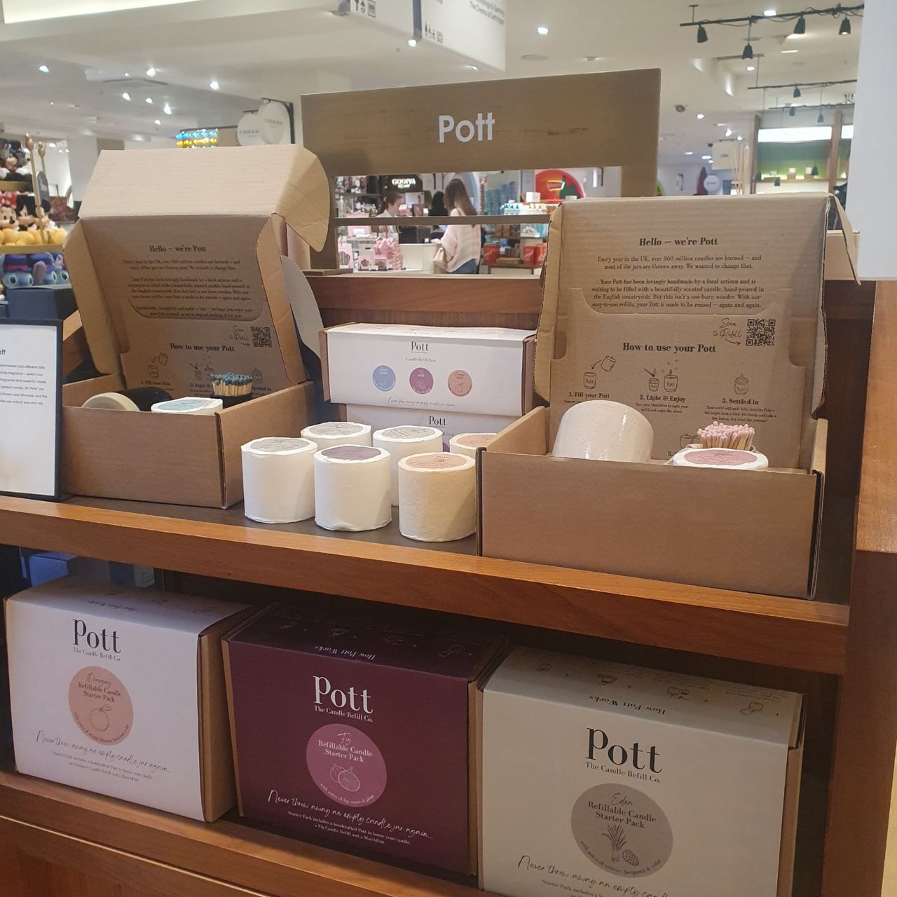 Refillable scented candles from Pott displayed at Selfridges