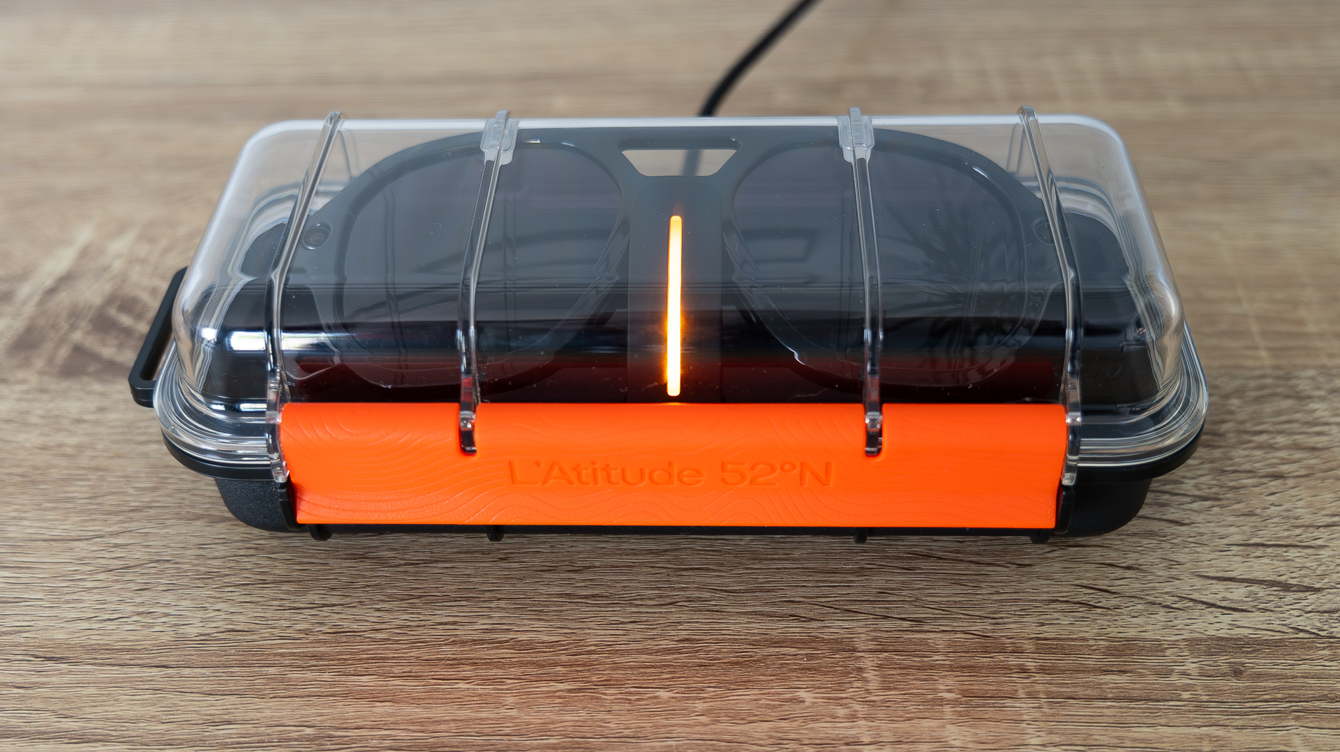 L'Atitude 52&amp;deg;N Smart Glasses review images, in case, on a sideboard and worn outside