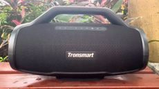 Tronsmart Bang Max outside, on a table in the rain
