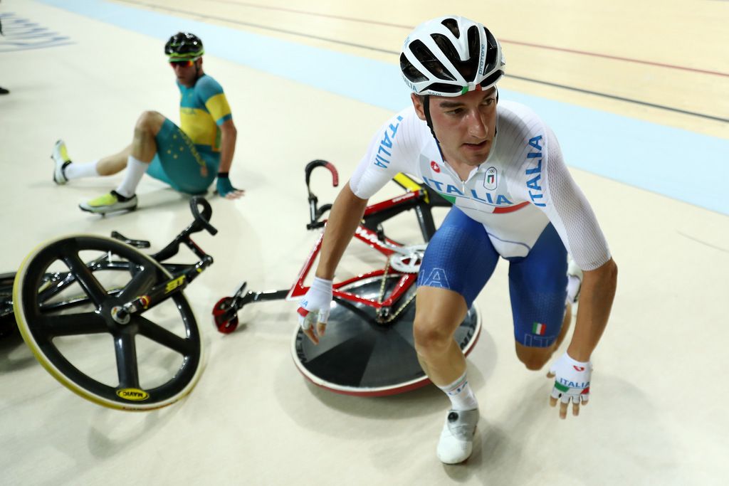 Elia Viviani (Italy) gets up having been involved in the crash