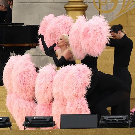 Lady Gaga in a pink and black feathered ensemble at the 2024 Olympics Opening Ceremony rehearsals in Paris July 2024