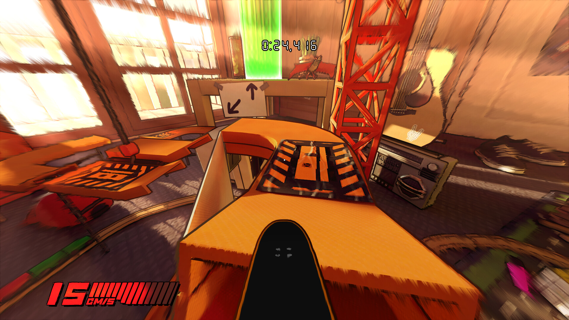 A skateboard racing down a cardboard track inside a cluttered room.