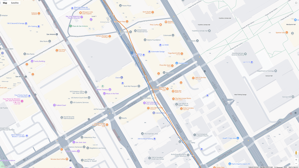 A GPS map showing how the Garmin Forerunner 970 (blue line) and Google Pixel Watch 4 (orange line) compare for a half-marathon test.