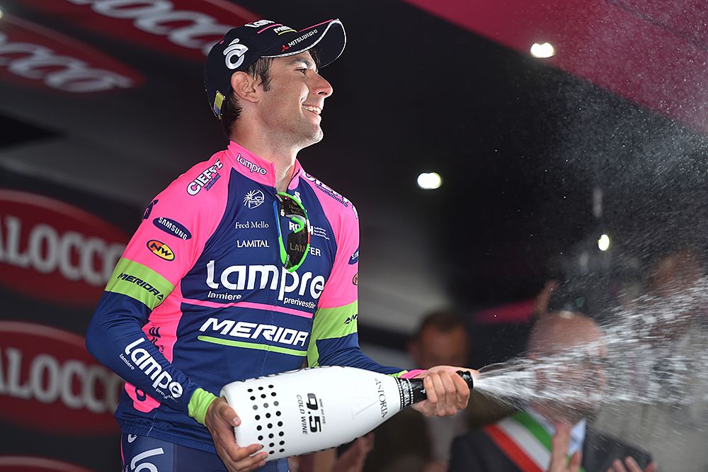 Ulissi celebrates with champagne