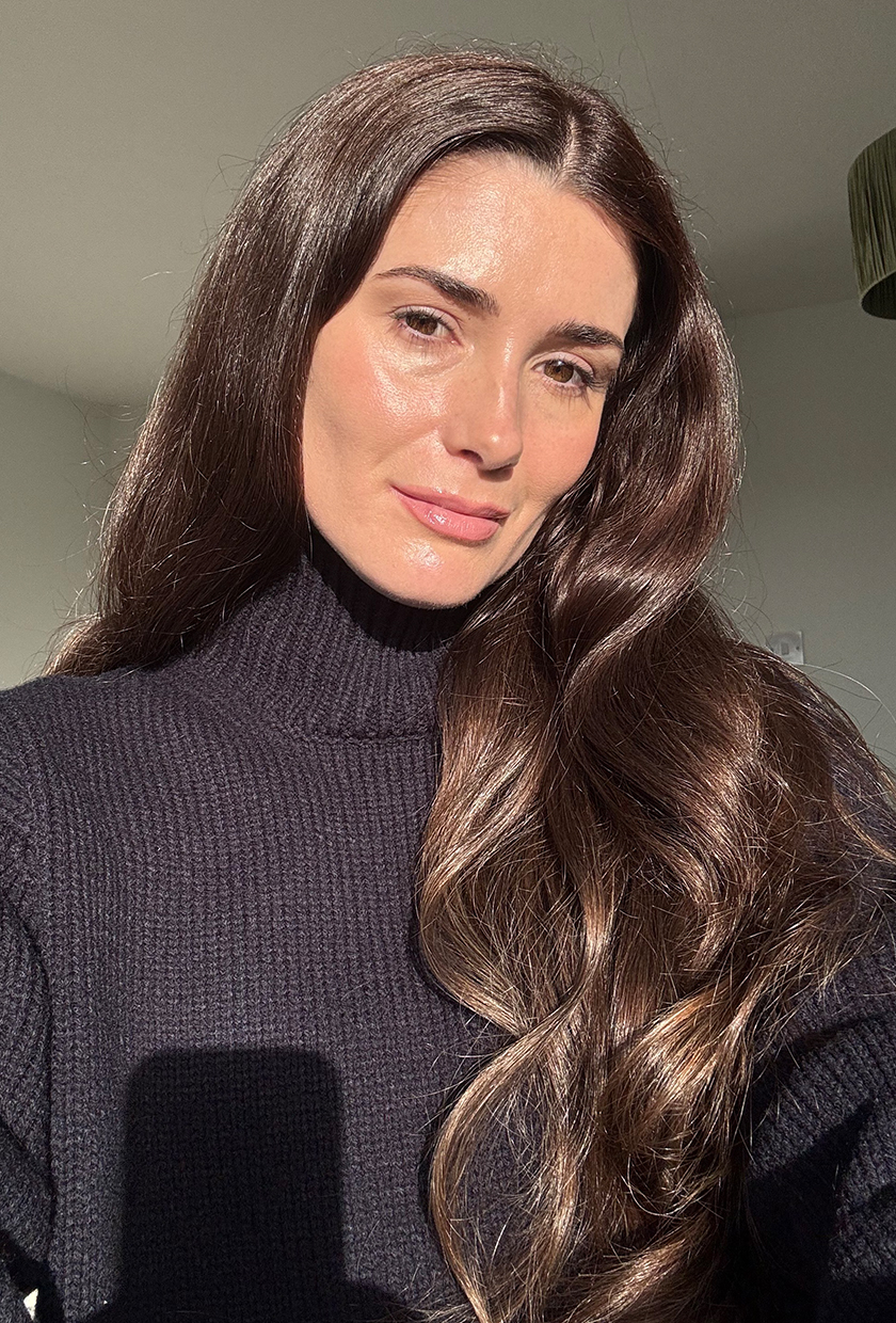 Beauty editor Eleanor Vousden with long brown hair after using the L'Oreal Paris Glycolic Gloss hair gloss treatment