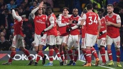 Arsenal players celebrate Gabriel Martinelli’s goal against Chelsea at Stamford Bridge 