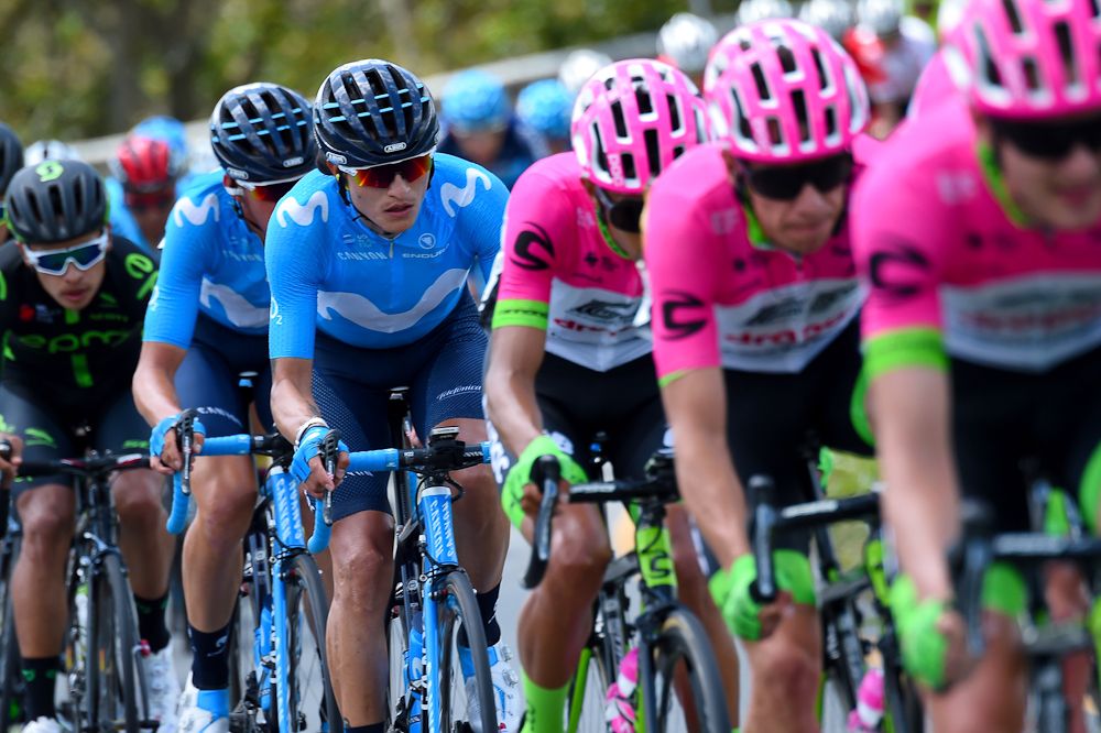 Winner Anacona (Movistar) rides behind the EF Education First-Drapac train