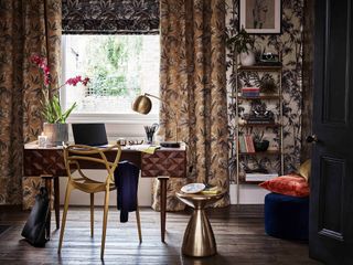 Regal and dramatic home office with gilded patterned blinds and drapes plus, other accents