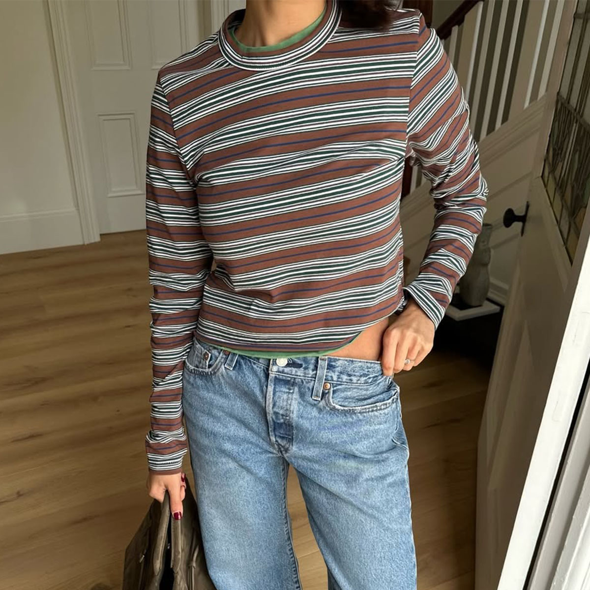 Woman in a stripe top and jeans
