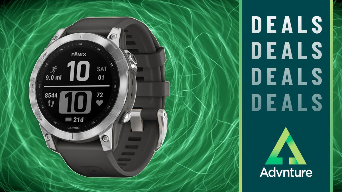 Garmin Fenix 7 watch on green background