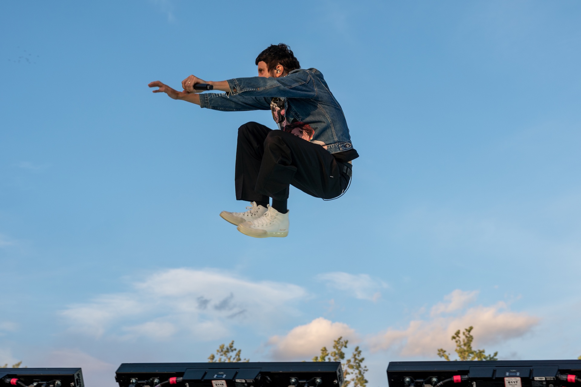 LONDON, UNITED KINGDOM - 2026/07/04: Sergio Pizzorno seen jumping high in the air while performing live with band Kasabian. Kasabian play headline concert at London's Finsbury Park Sat 4 July. (Photo by Bonnie Britain/SOPA Images/LightRocket via Getty Images)