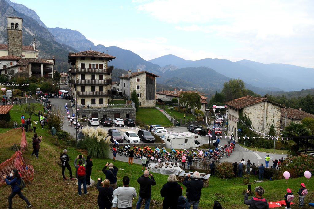 PIANCAVALLO ITALY OCTOBER 18 Joao Almeida of Portugal and Team Deceuninck QuickStep Pink Leader Jersey Wilco Kelderman of The Netherlands and Team Sunweb Poffabro Village 506m Peloton Landscape Fans Public Mountains during the 103rd Giro dItalia 2020 Stage 15 a 185km stage from Base Aerea Rivolto Frecce Tricolori to Piancavallo 1290m girodiitalia Giro on October 18 2020 in Piancavallo Italy Photo by Tim de WaeleGetty Images