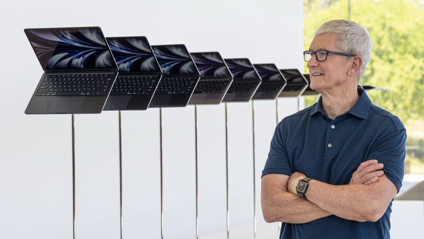 Tim Cook standing next to MacBook Air M2