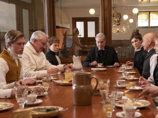 Cast of The Gilded Age sits around a table