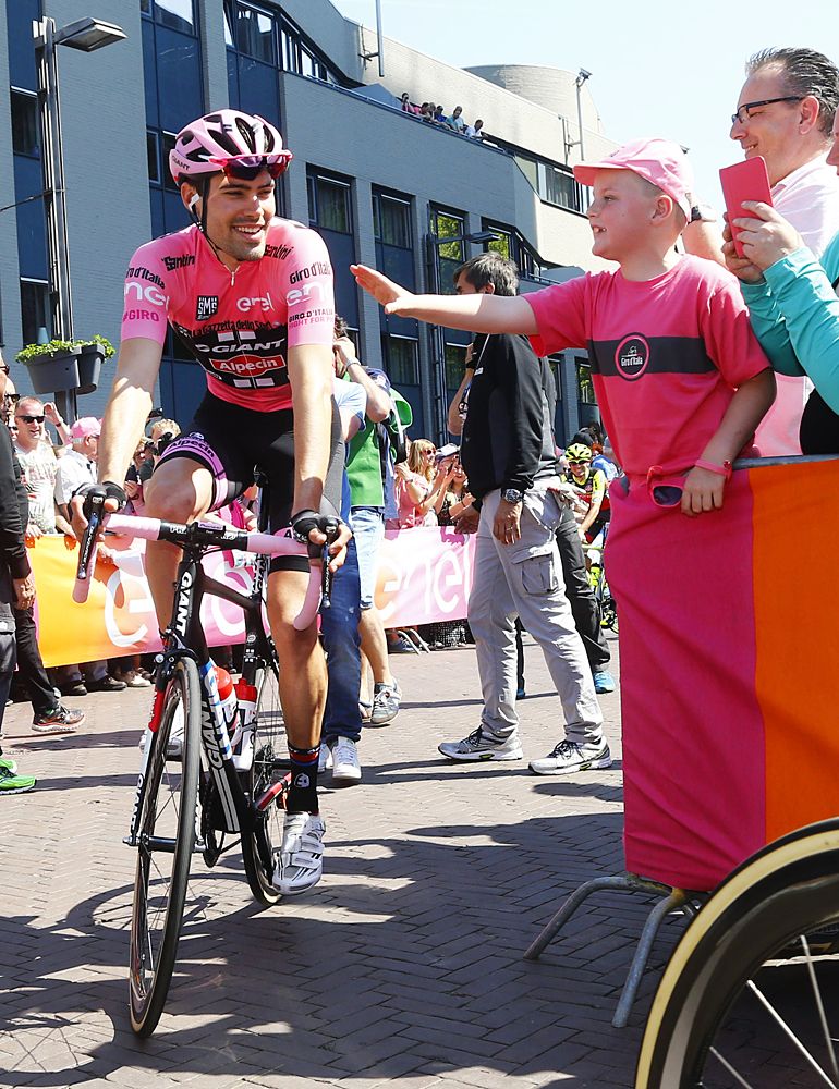 Tom Dumoulin (Giant-Alpecin) passes lots of fans and pink shirts in Arnhem