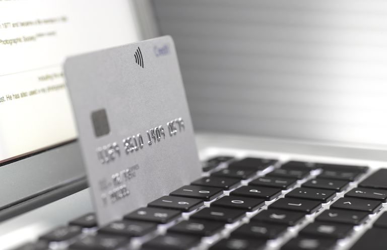 Close up of a credit card on a laptop