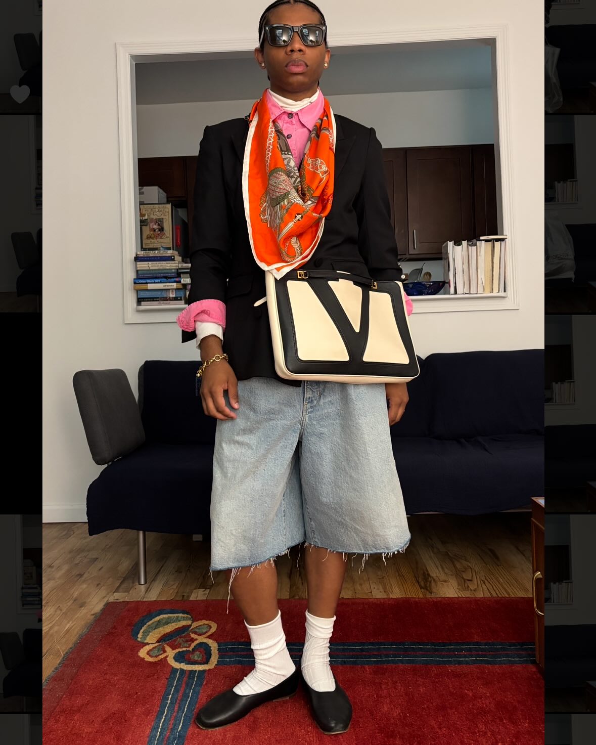 jalil johnson wearing denim shorts